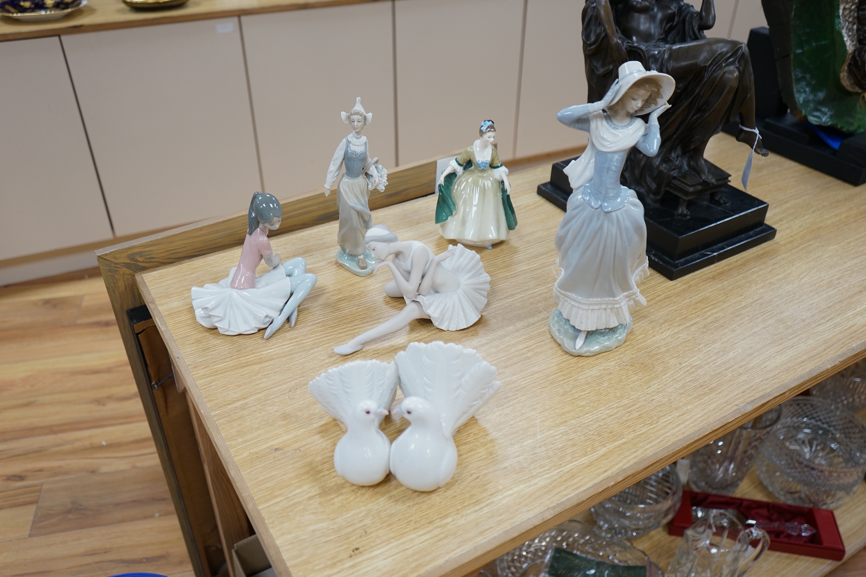 Five Lladro figurines and birds together with a Royal Doulton figure ‘Elegance’, HN2264, largest 36cm high. Condition - good